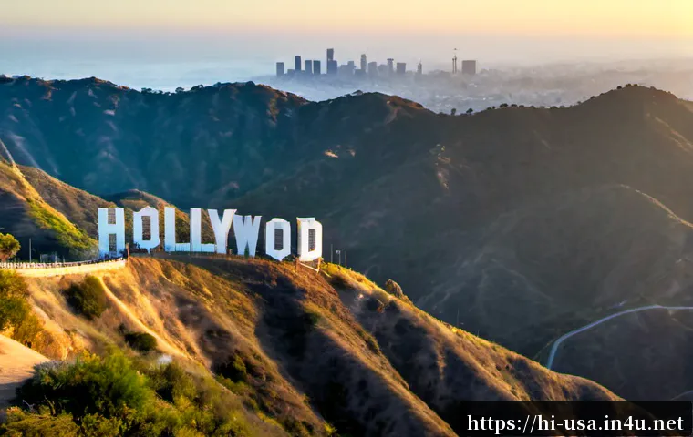 Home 17 로스앤젤레스 유명 관광지 - Photorealistic sunrise view of the Hollywood Sign on the rugged green hills of Los Angeles, seen fro...